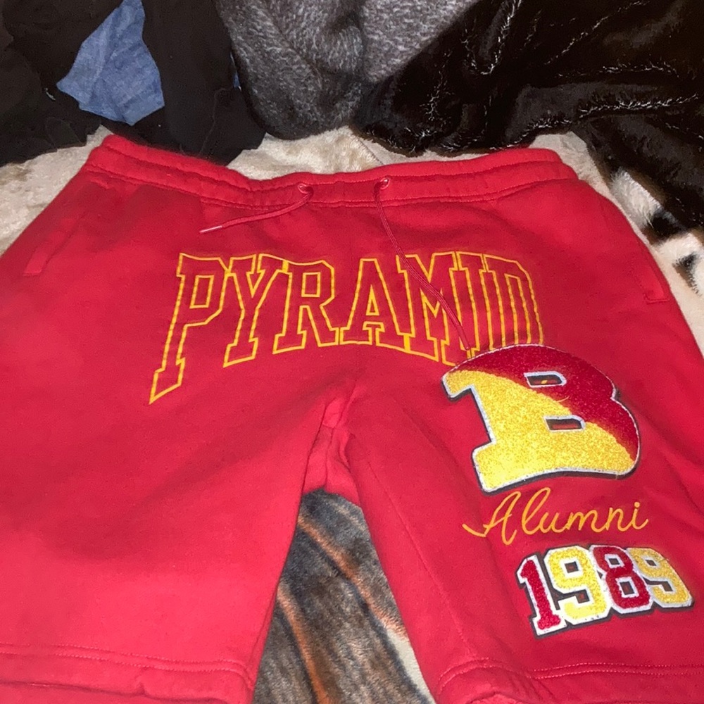 Red and yellow pyramid shorts